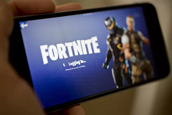 Fortnite cuối cùng đã được thiết lập để trở lại iPhone ở Hoa Kỳ, gần năm năm sau khi trò chơi được kéo. Nhiếp ảnh gia: Andrew Harrer/Bloomberg qua Getty Images.